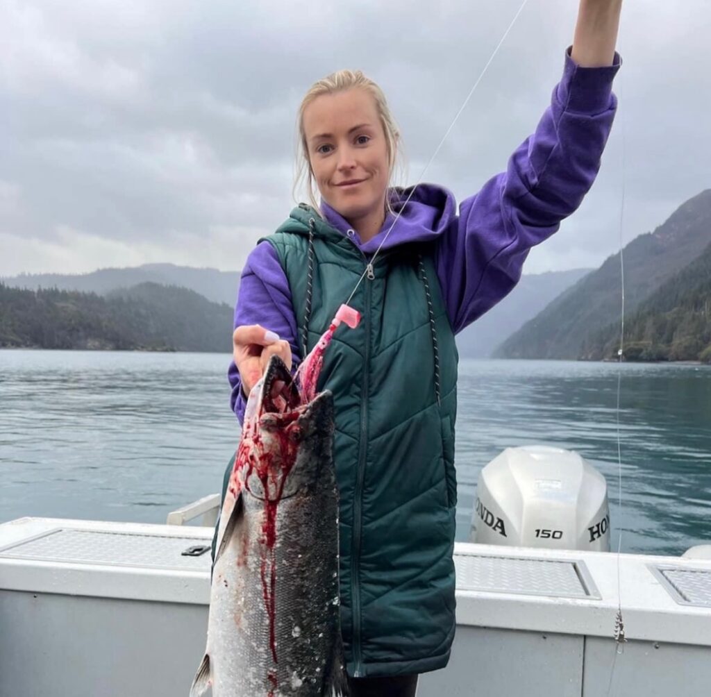 Woman holding salmon